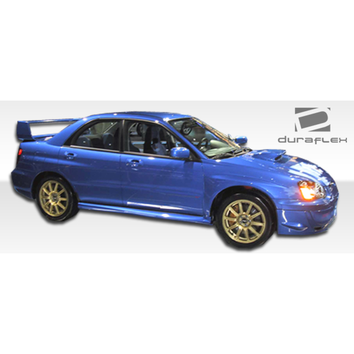 Modify your Subaru Impreza 2002 with our Exterior/Complete Body Kits - Side view angle of blue Subaru Impreza WRX STI