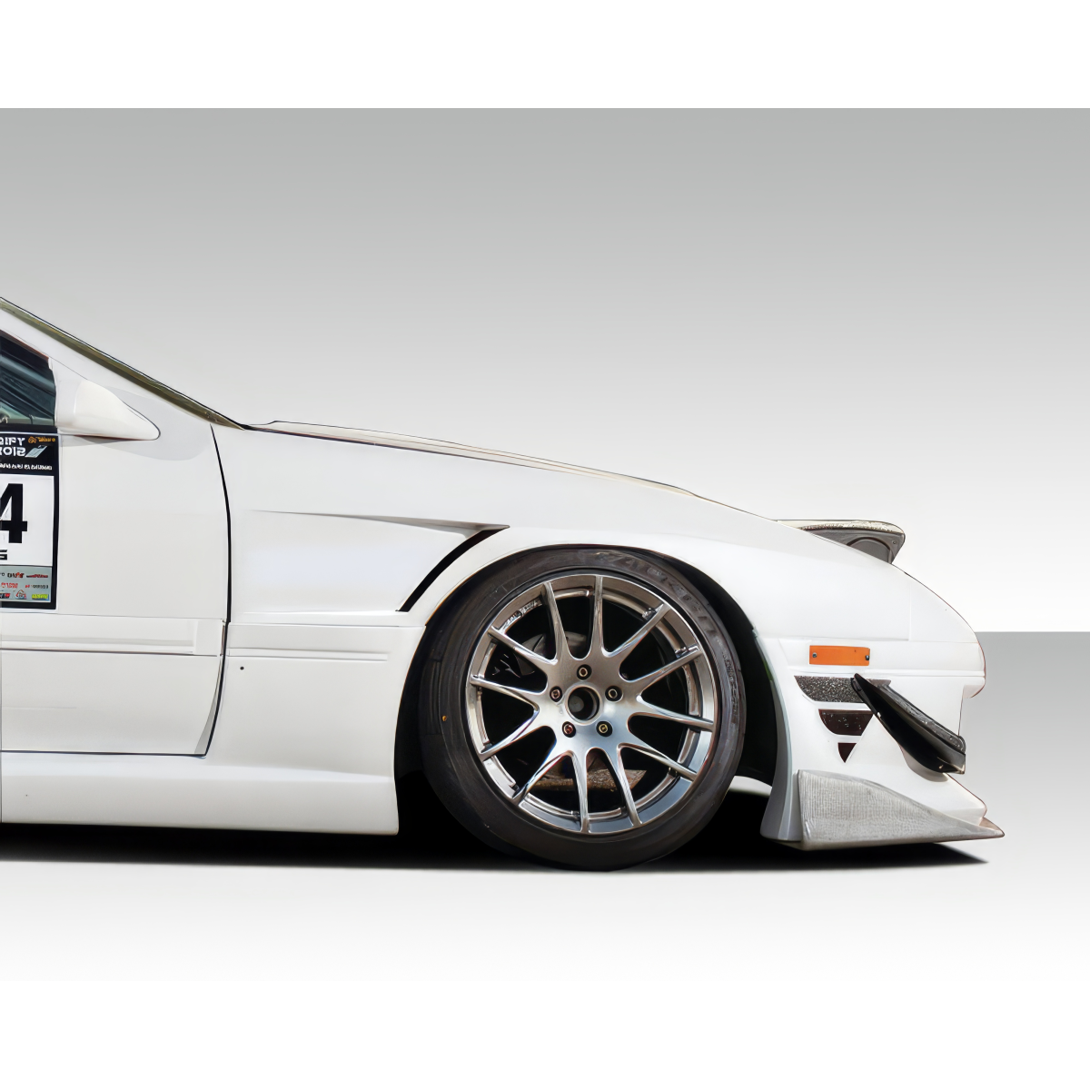 Modify your Mazda RX-7 1986 with our Exterior/Fenders - Front angle view of Mazda RX-7 fender part