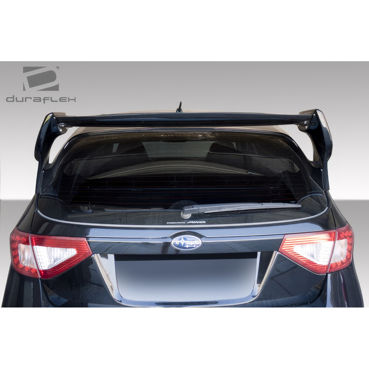 Modify your Subaru Impreza 2008 with our Exterior/Wings - Rear view at a low angle of the trunk lid