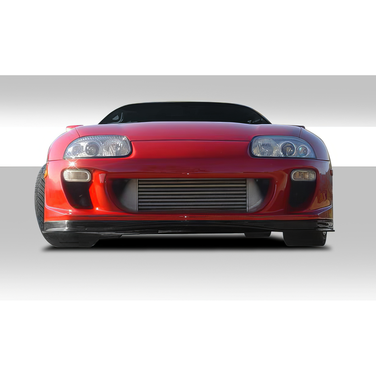 Modify your Toyota Supra 1993 with our Exterior/Front Bumpers or Lips - Front angle view of red Toyota Supra bumper