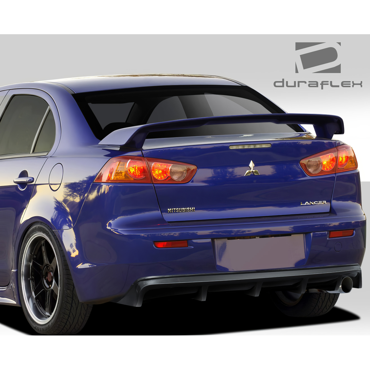 Modify your Mitsubishi Lancer 2008 with our Exterior/Diffusers - Rear angle view of a modified vehicle