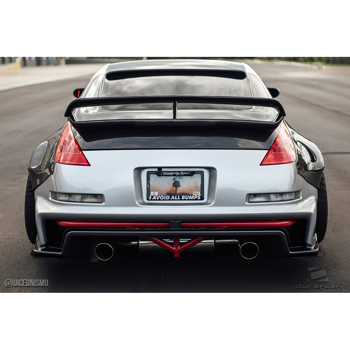 Modify your Nissan 350Z 2003 with our Exterior/Wings - The image is viewed from a rear angle