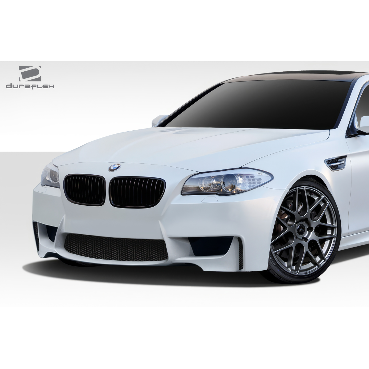 Modify your BMW 5-Series 2011 with our Exterior/Front Bumpers or Lips - Front angle of vehicle showing bumper design