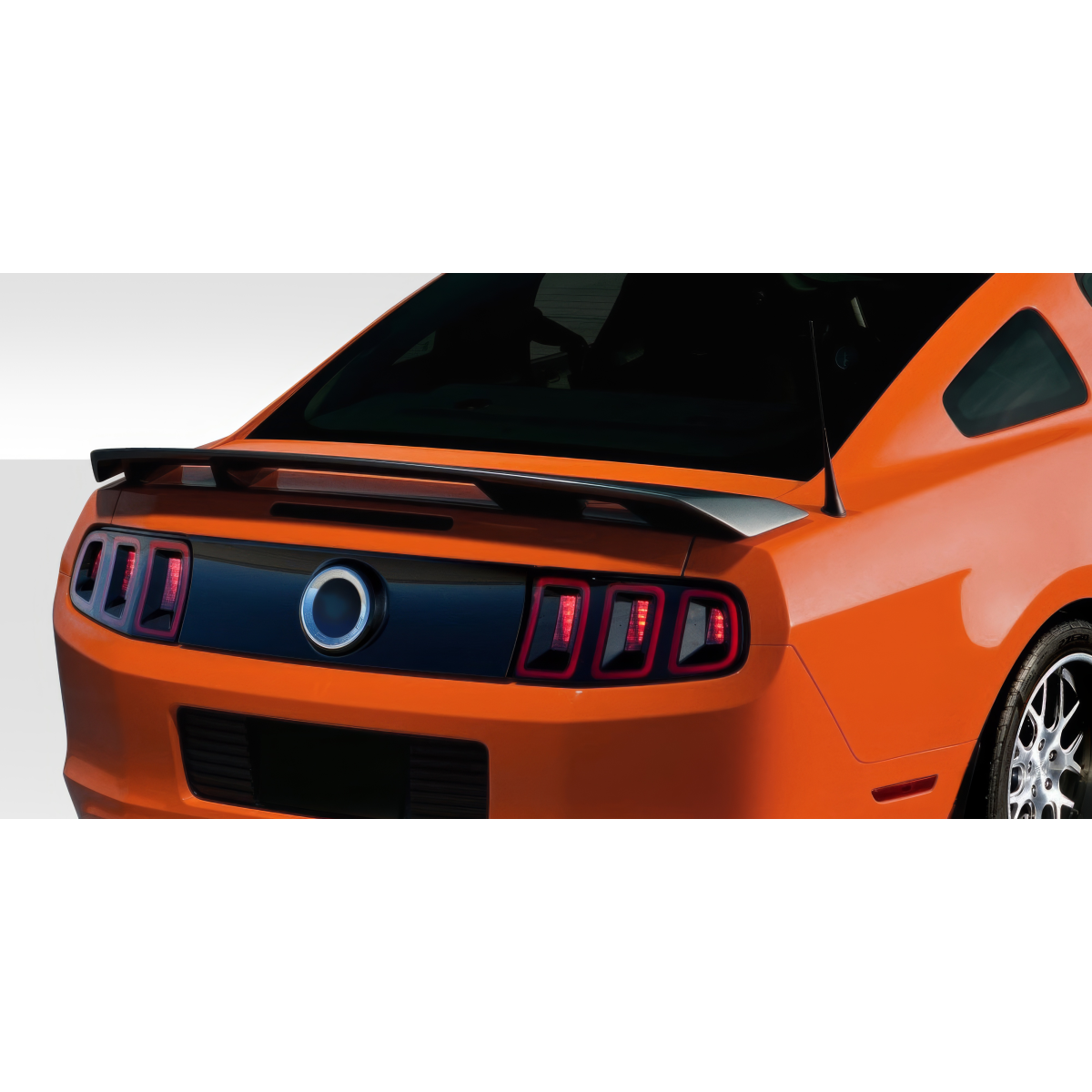 Modify your Ford Mustang 2010 with our Exterior/Wings - Rear angle view showcasing wing spoiler design