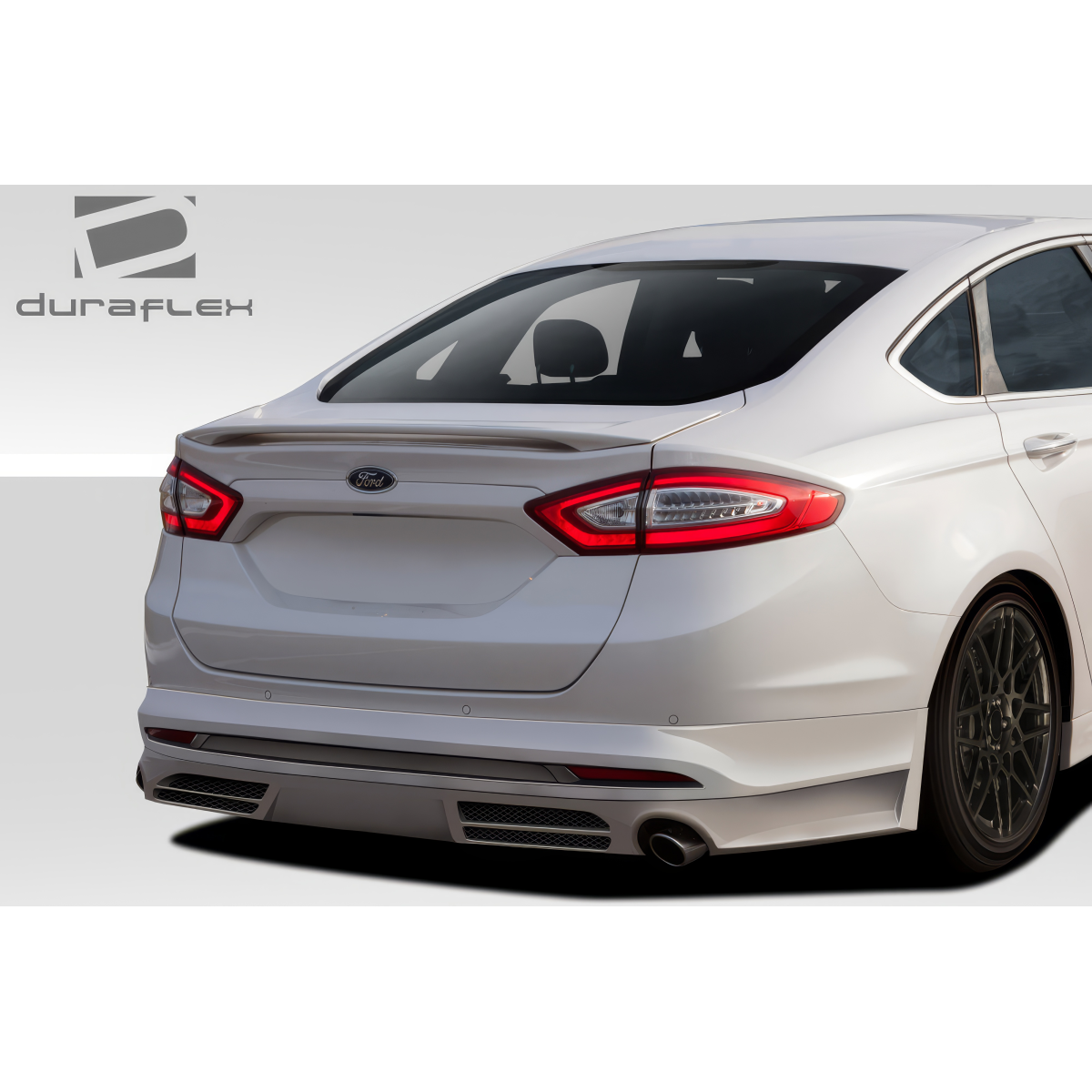 Modify your Ford Fusion 2013 with our Exterior/Complete Body Kits - Viewed from the rear at a slight angle