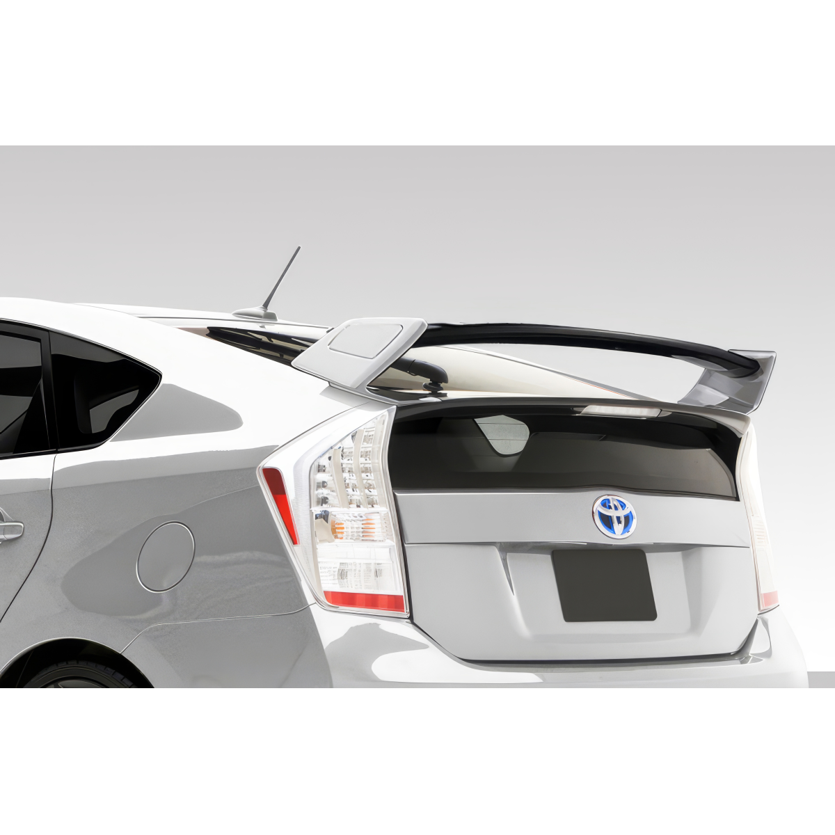 Modify your Toyota Prius 2010 with our Exterior/Wings - Rear view angle showcasing a spoiler on Prius