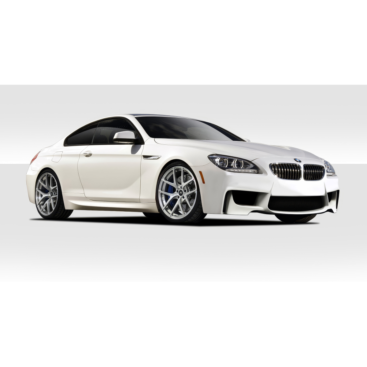 Modify your BMW 4-Series 2011 with our Exterior/Complete Body Kits - Side angle view of a white BMW 4 Series coupe