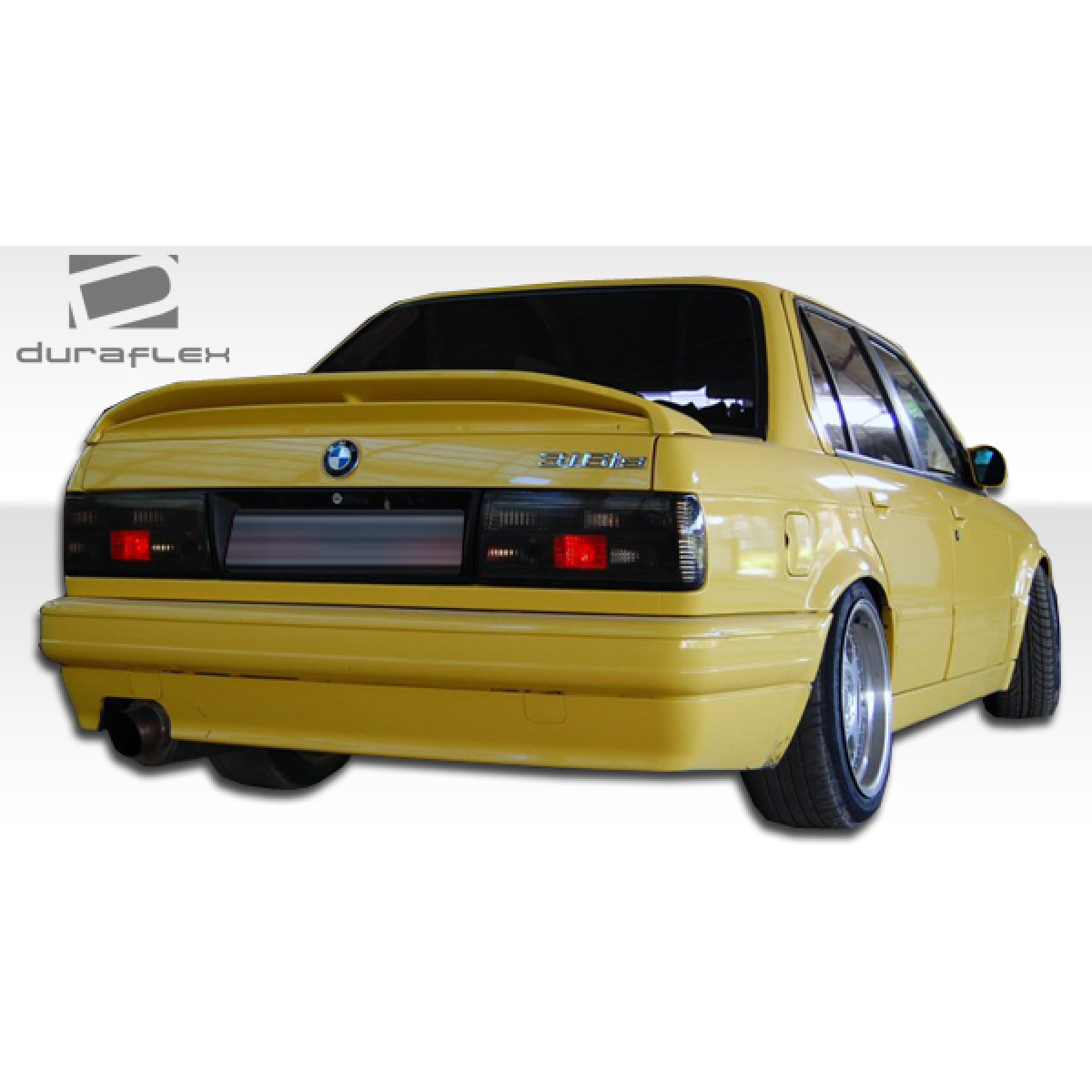 Modify your BMW 3-Series 1984 with our Exterior/Complete Body Kits - Rear perspective view of BMW 3 Series E30