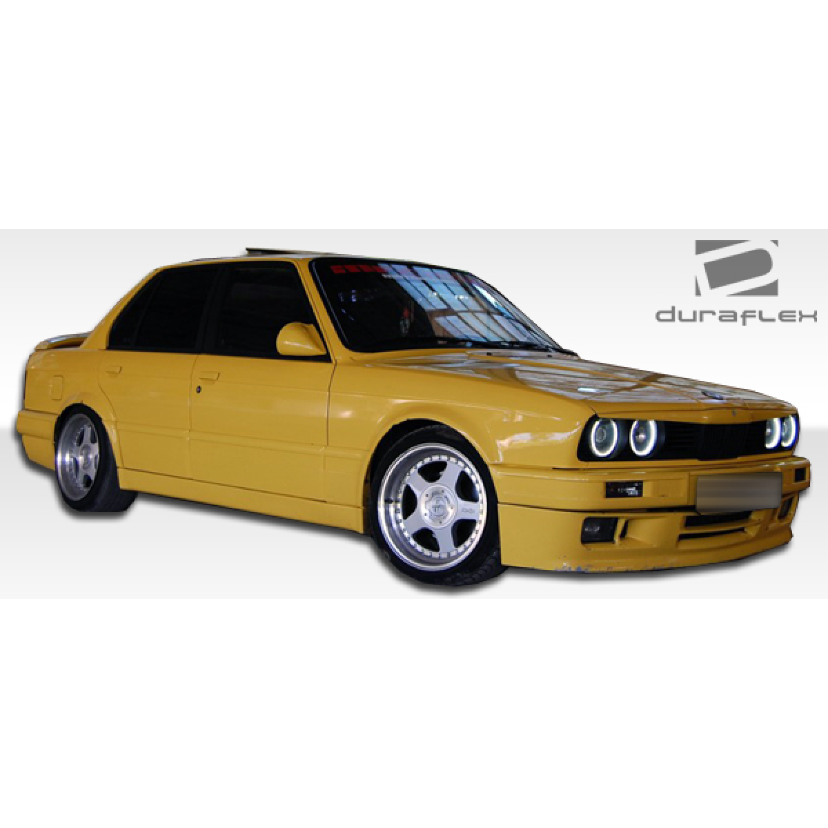 Modify your BMW 3-Series 1984 with our Exterior/Complete Body Kits - The angle shows the vehicle from the front side