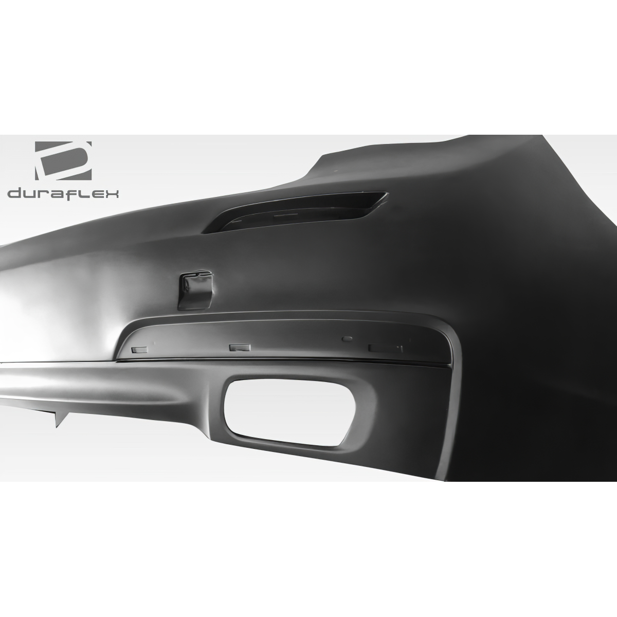 Modify your BMW 7-Series 2009 with our Exterior/Rear Bumpers or Lips - Angled side view of rear bumper part