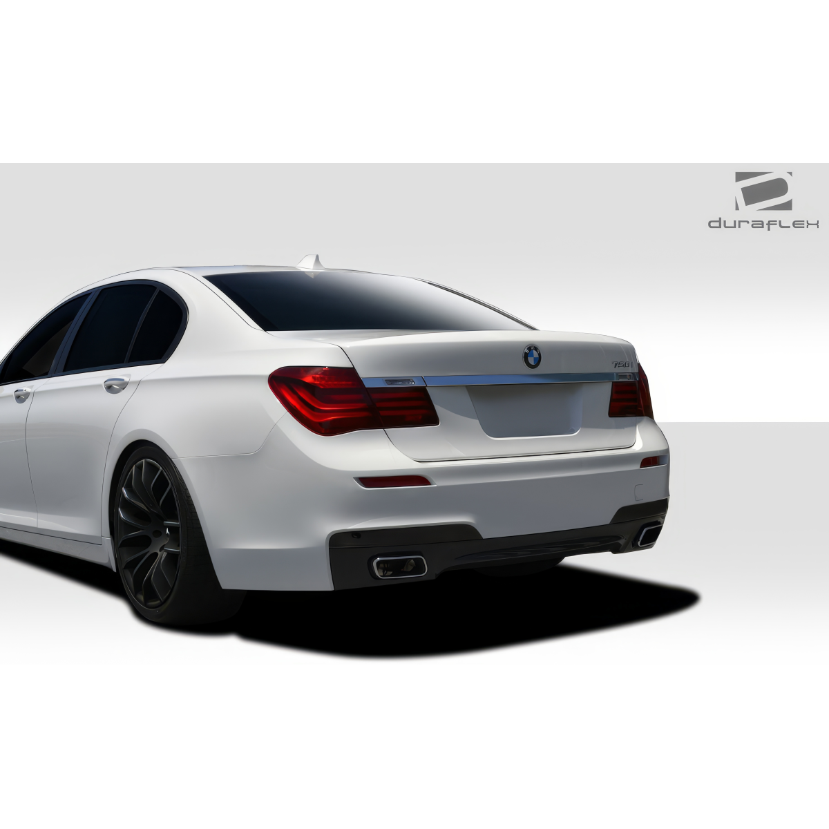 Modify your BMW 7-Series 2009 with our Exterior/Rear Bumpers or Lips - Slightly angled rear view of the vehicle