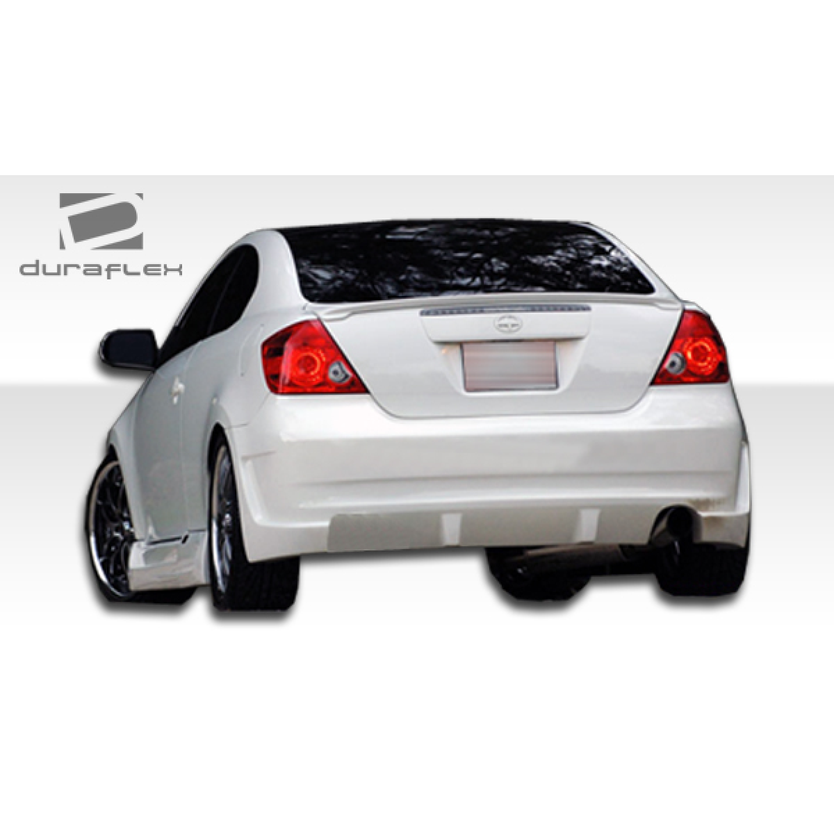 Modify your Scion tC 2005 with our Exterior/Complete Body Kits - Rear angle view of the vehicle showing body kit