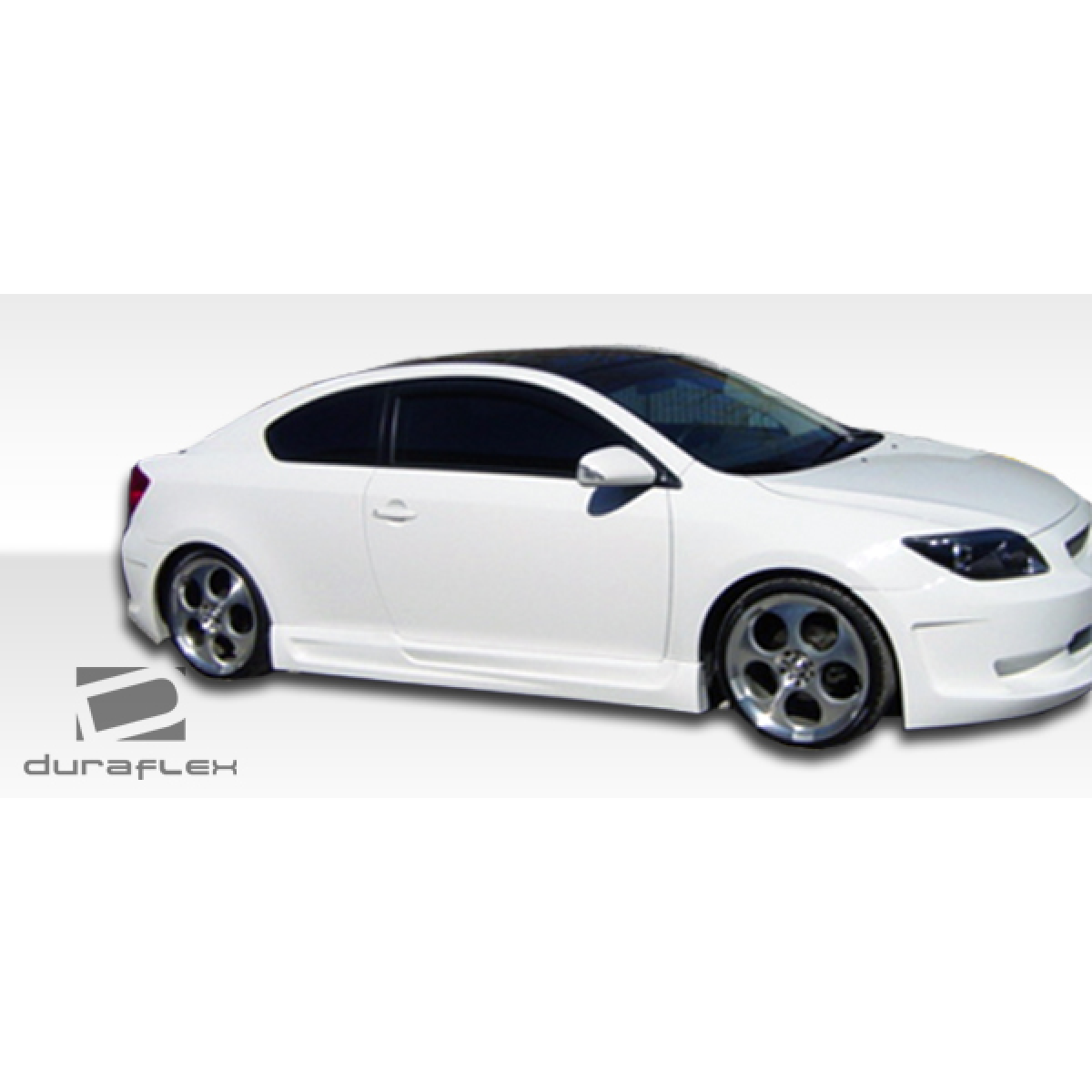 Modify your Scion tC 2005 with our Exterior/Complete Body Kits - Side angle view of a modified Scion tC vehicle