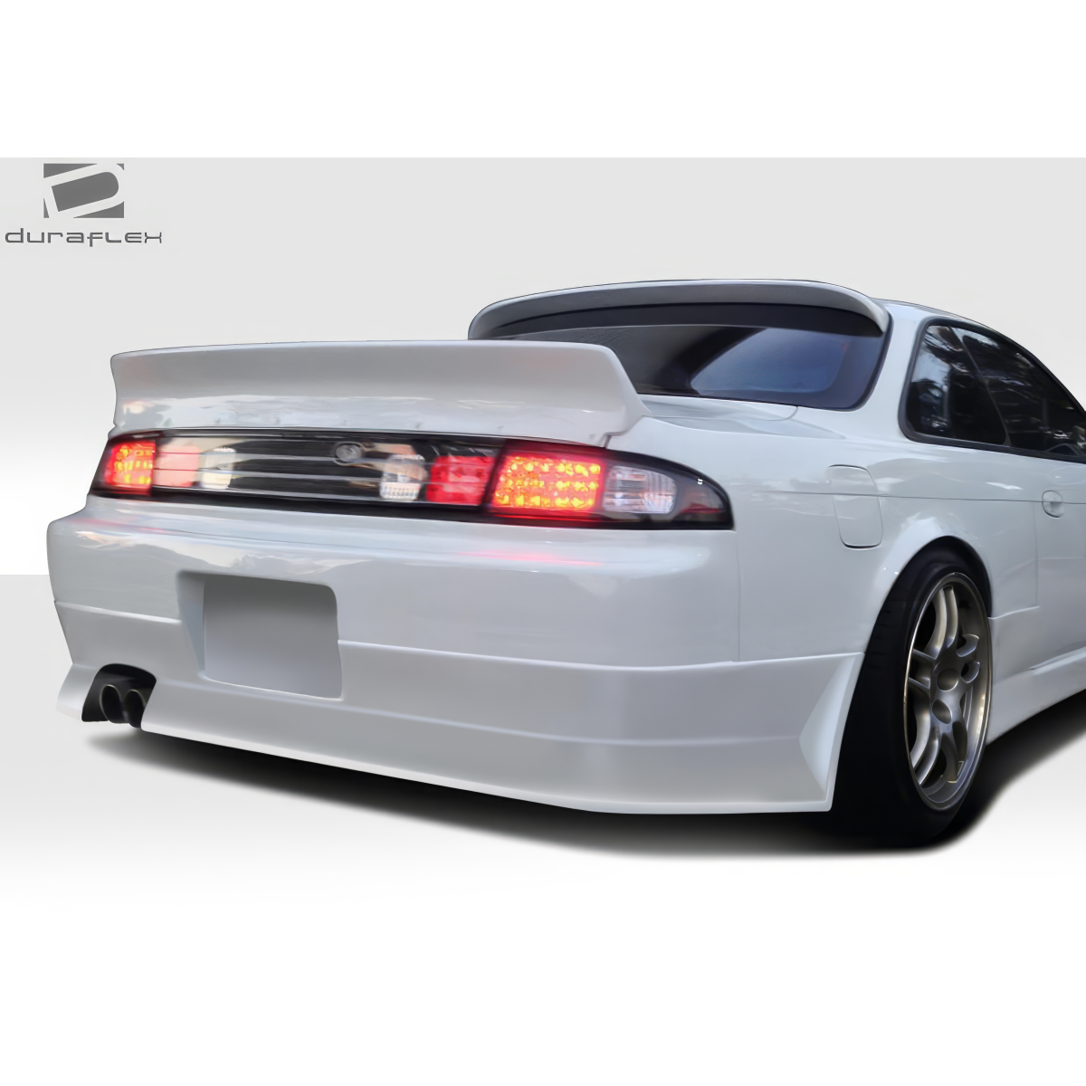 Modify your Nissan 240SX 1995 with our Exterior/Rear Bumpers or Lips - Rear angle showcasing the bumper and tail lights