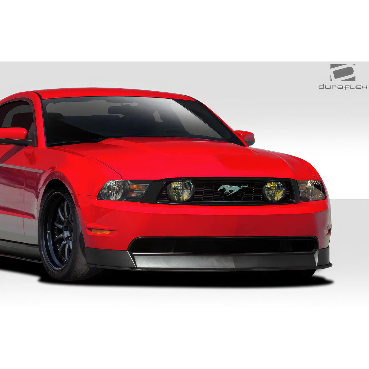 Modify your Ford Mustang 2010 with our Exterior/Complete Body Kits - Front angle view of vehicle showing front lip