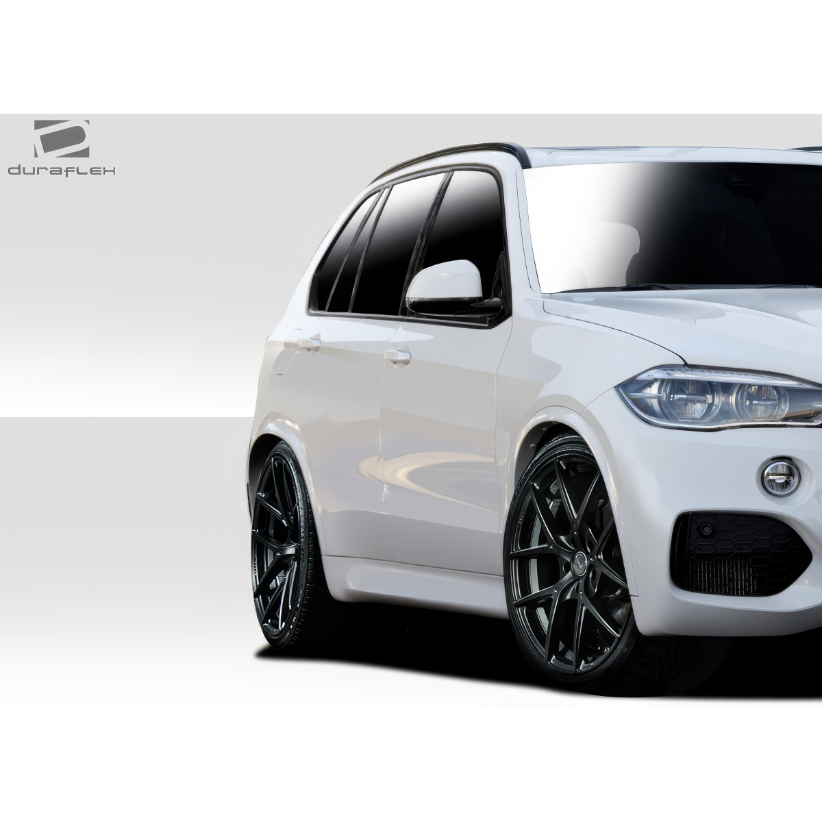 Modify your BMW X5 2014 with our Exterior/Side Skirts - 3 quarter angle view of a BMW X5 SUV