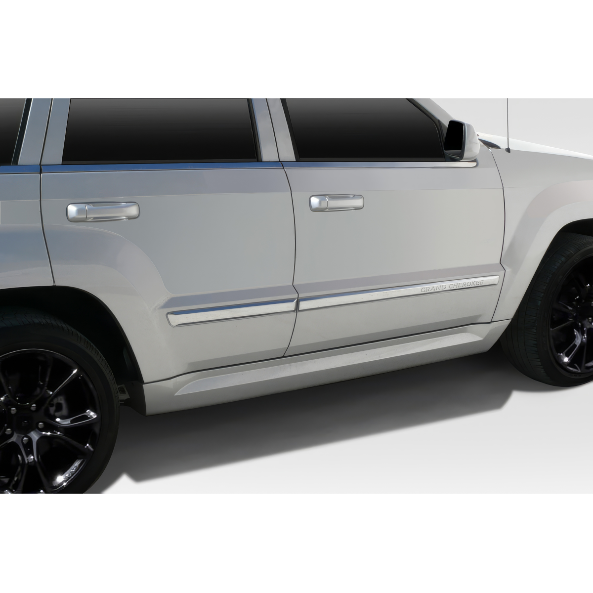 Modify your Jeep Cherokee 2005 with our Exterior/Side Skirts - Side view of vehicle part at a slight angle