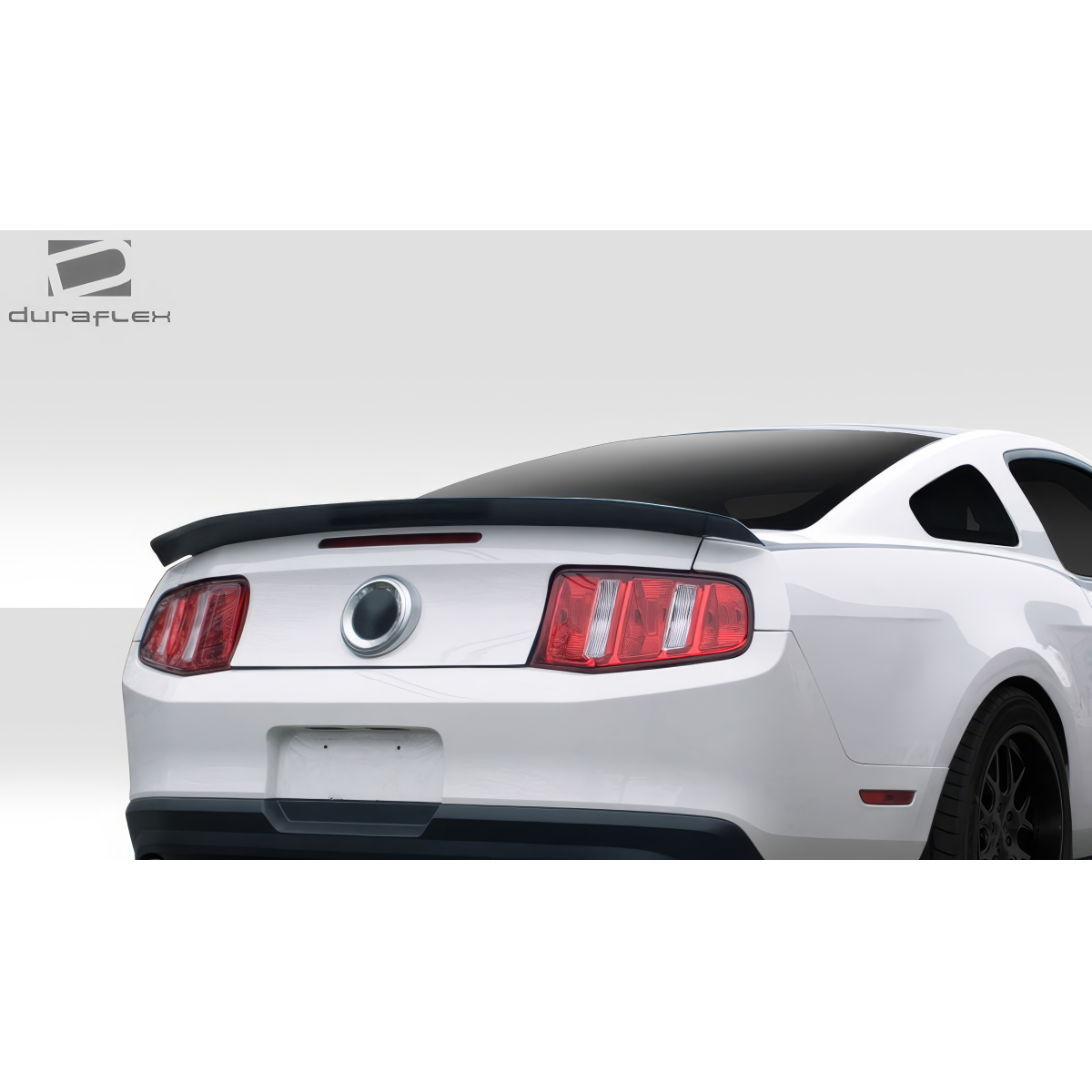 Modify your Ford Mustang 2010 with our Exterior/Wings - Rear angle view of a Ford Mustang