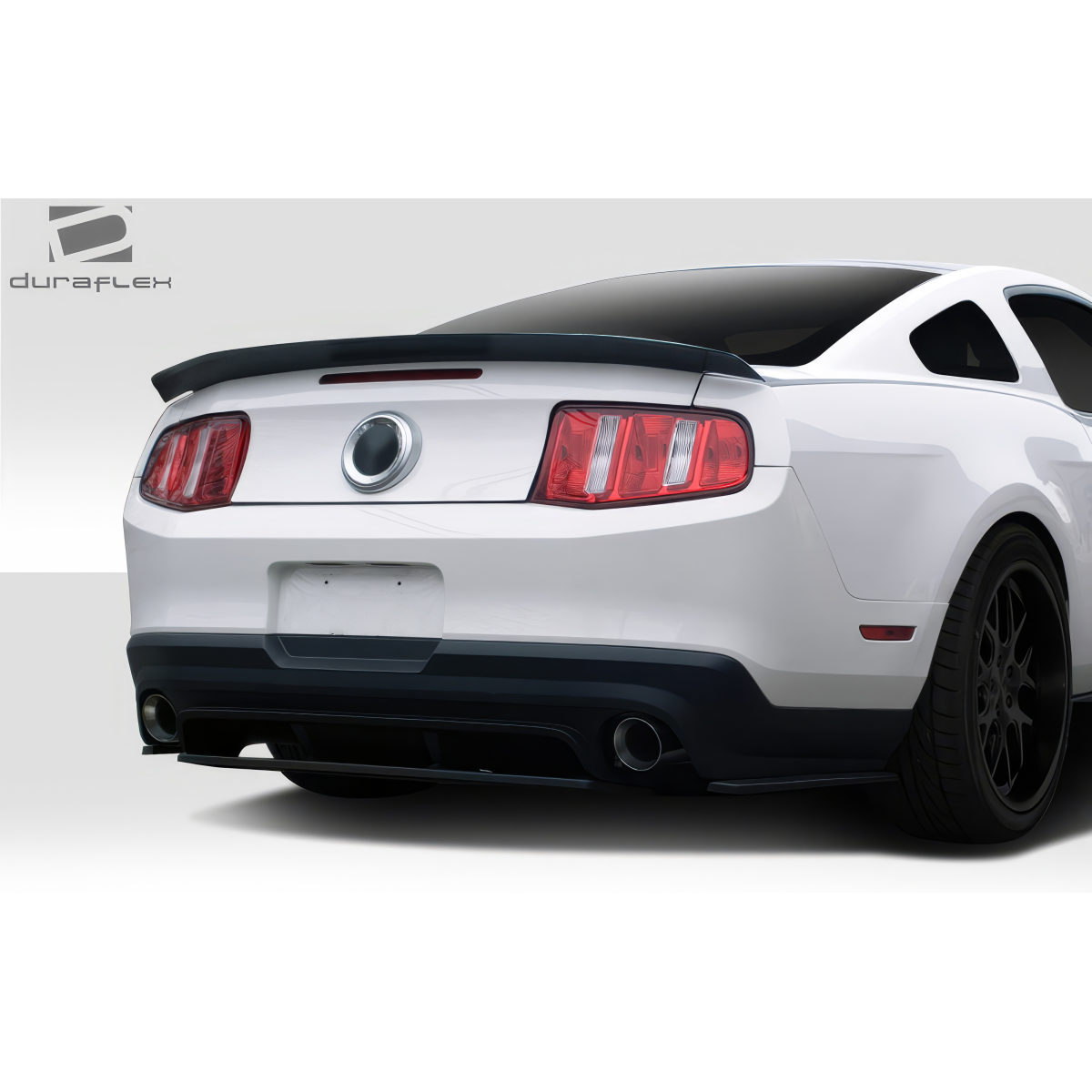 Modify your Ford Mustang 2010 with our Exterior/Complete Body Kits - Rear angle view of the rear diffuser on a Mustang