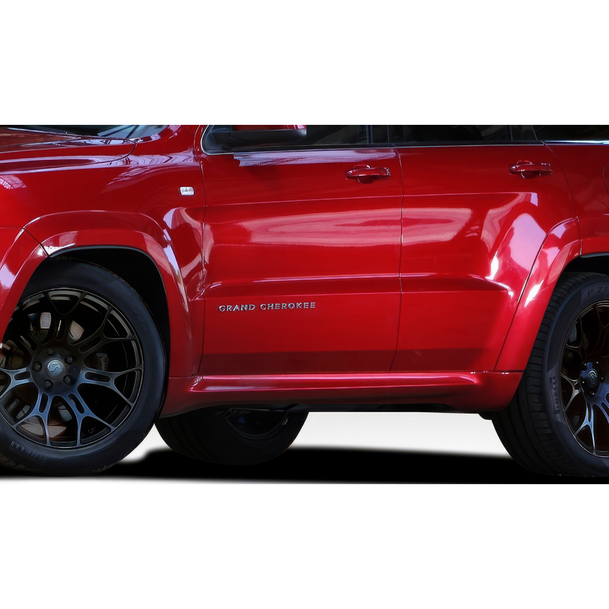 Modify your Jeep Cherokee 2011 with our Exterior/Complete Body Kits - Side view of red Jeep Cherokee at an angle