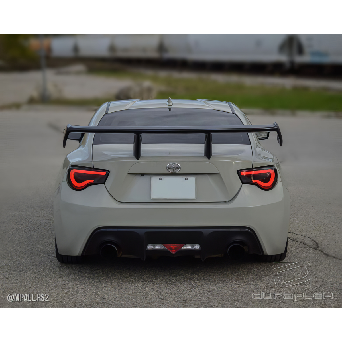 Modify your Subaru BRZ 2013 with our Exterior/Wings - Rear angle view of vehicle with wing spoiler