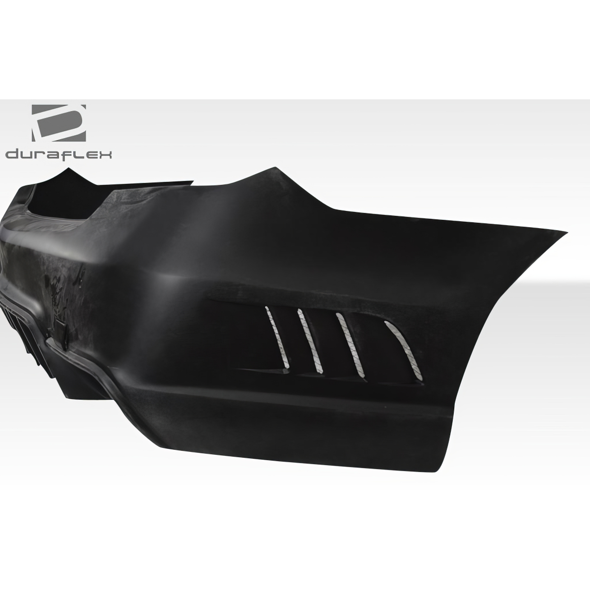 Modify your Mercedes-Benz E-Class 2010 with our Exterior/Rear Bumpers or Lips - The part is shown at a side angle view