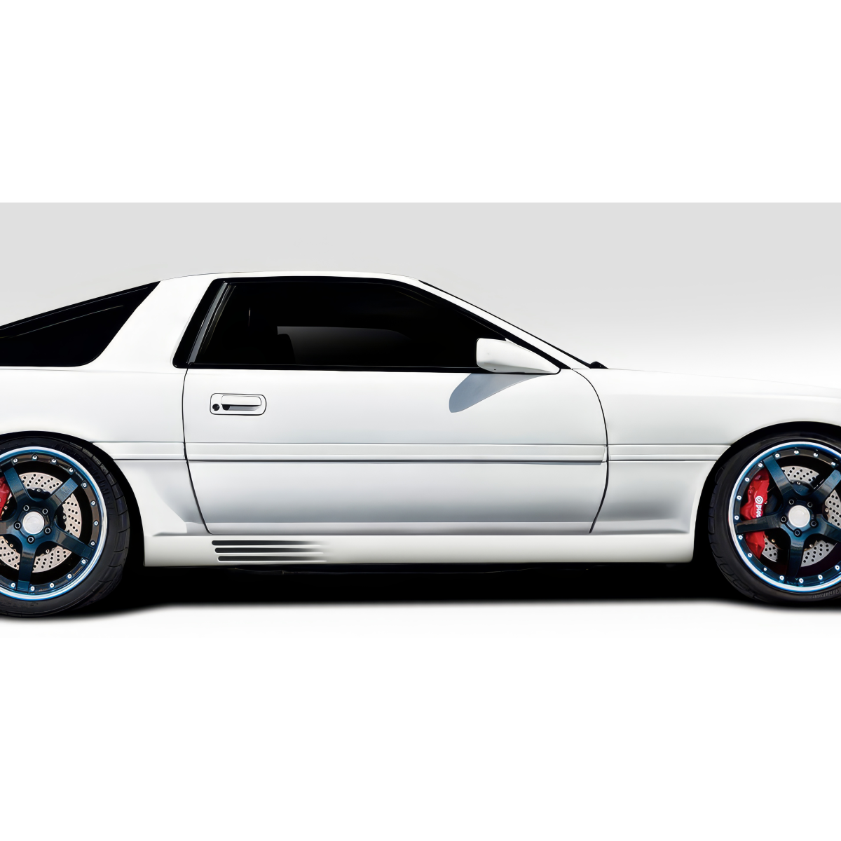 Modify your Toyota Supra 1986 with our Exterior/Side Skirts - Side profile view of the vehicle