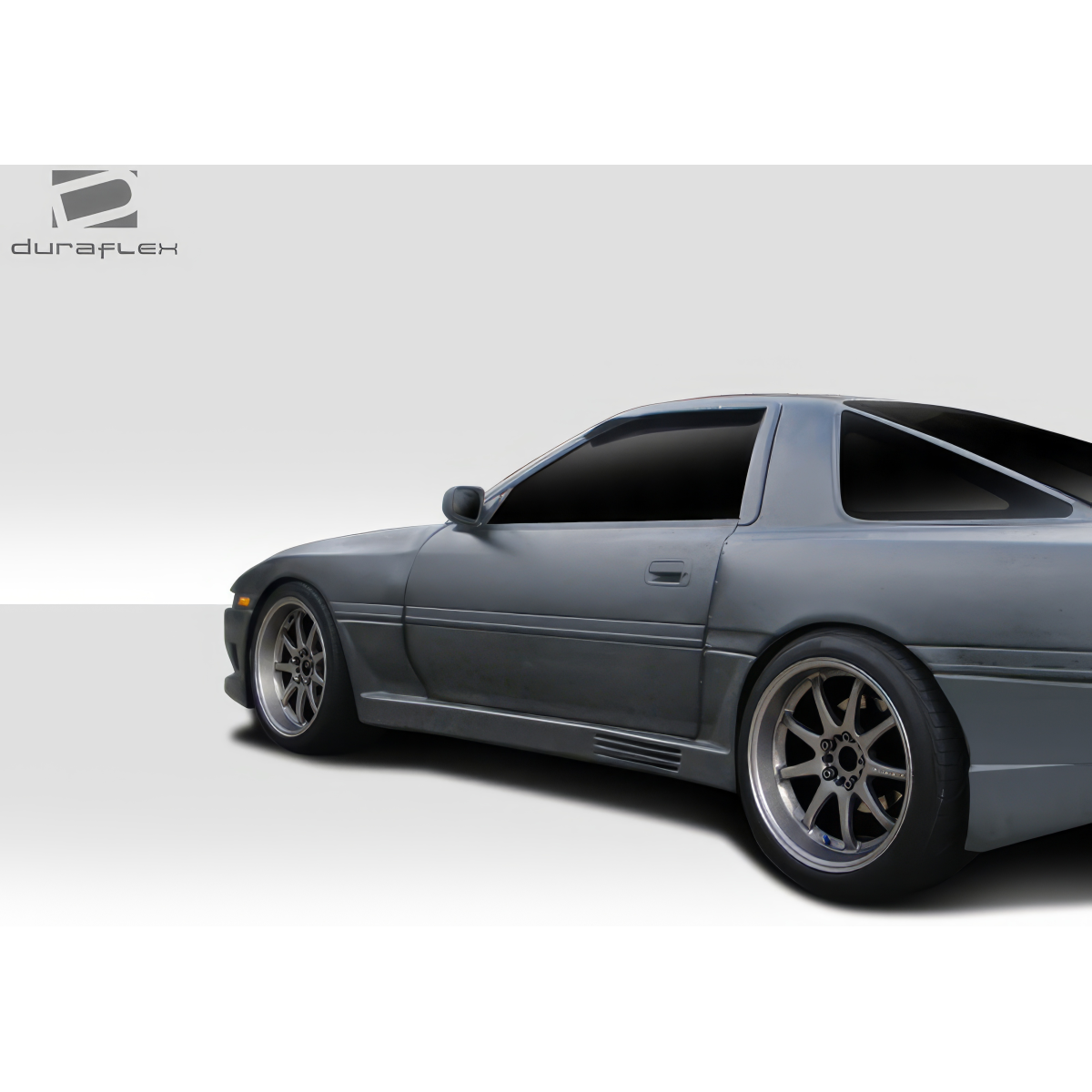 Modify your Toyota Supra 1986 with our Exterior/Side Skirts - Side view angle showcasing side skirt