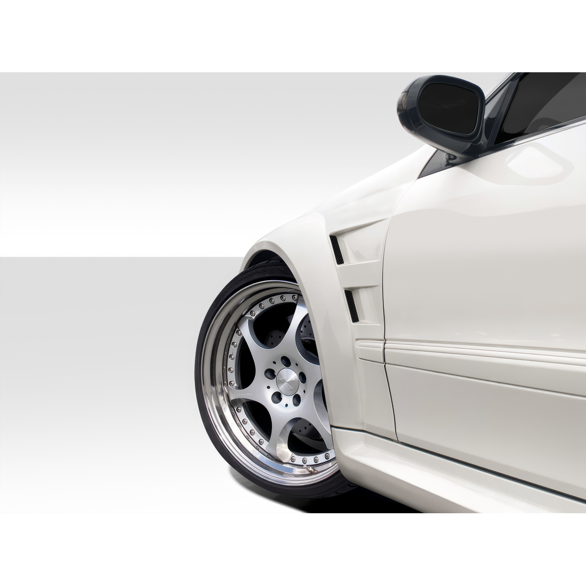 Modify your Mercedes-Benz CLK-Class 2003 with our Exterior/Fenders - Close up view of front fender at low angle perspective