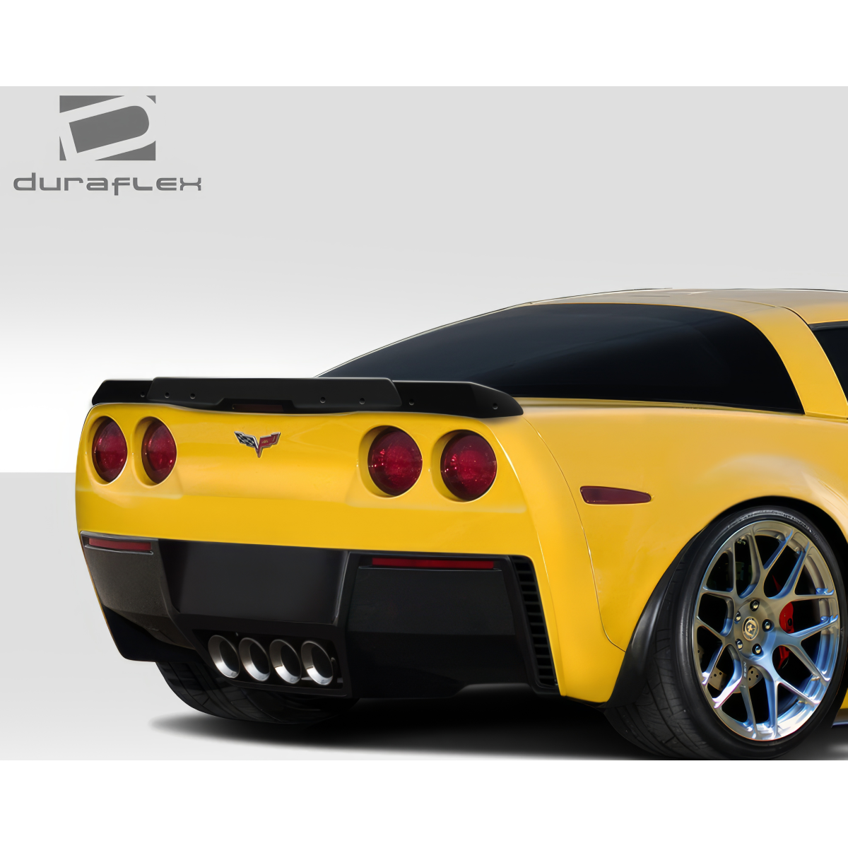 Modify your Chevrolet Corvette 2005 with our Exterior/Wings - Rear angle view highlighting wing and exhaust design