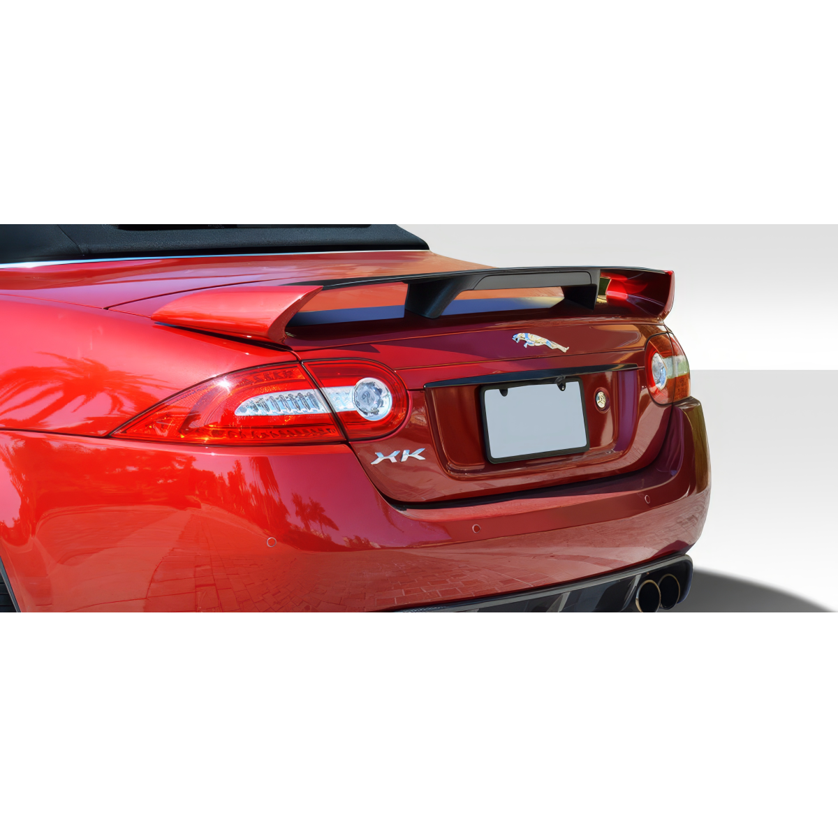 Modify your Jaguar XK8 2007 with our Exterior/Wings - Rear view angle of the car with spoiler