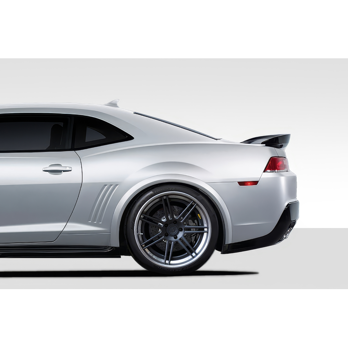 Modify your Chevrolet Camaro 2010 with our Exterior/Fenders - Image shows rear side profile angle of vehicle