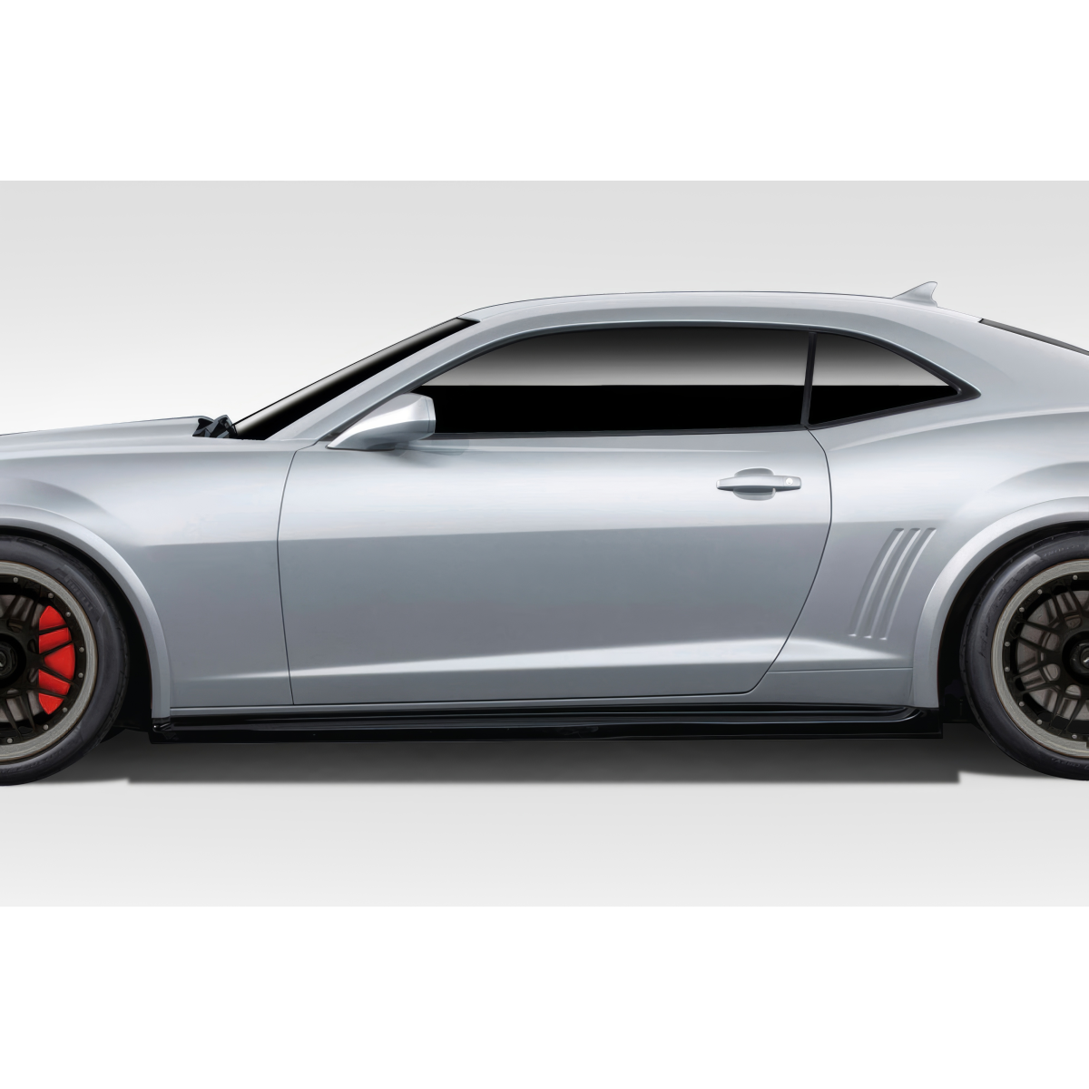 Modify your Chevrolet Camaro 2010 with our Exterior/Side Skirts - Side view angle of a Camaro in silver finish