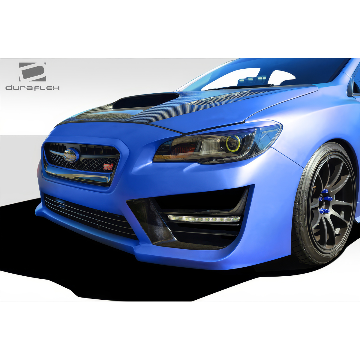 Modify your Subaru WRX 2015 with our Exterior/Front Bumpers or Lips - Front angle view of a blue Subaru WRX bumper