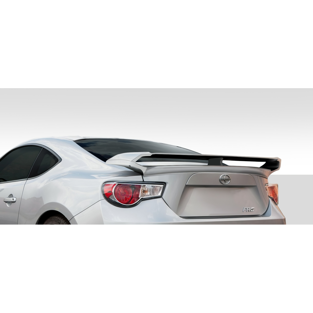 Modify your Subaru BRZ 2013 with our Exterior/Wings - Rear view at a slight angle showing the spoiler