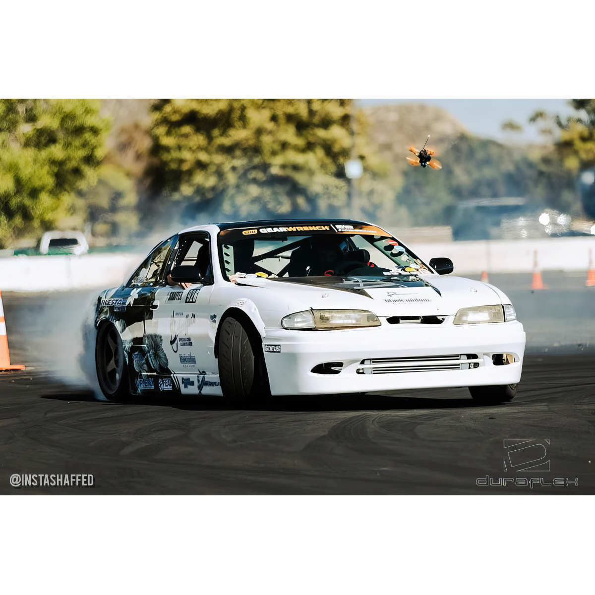 Modify your Nissan 240SX 1995 with our Exterior/Front Bumpers or Lips - Vehicle at an angle close to drifting position