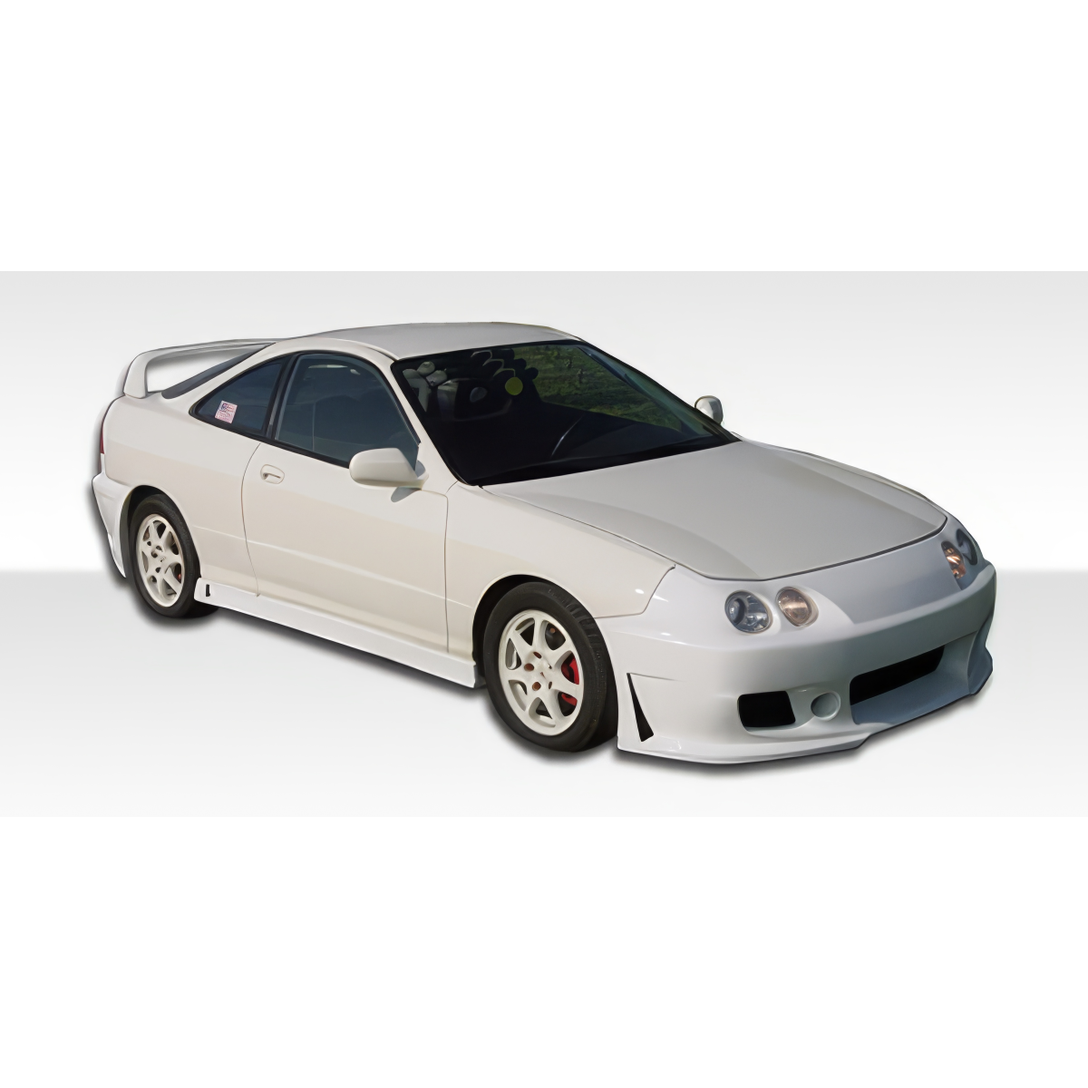 Modify your Acura Integra 1994 with our Exterior/Complete Body Kits - Front right angle view of the vehicle