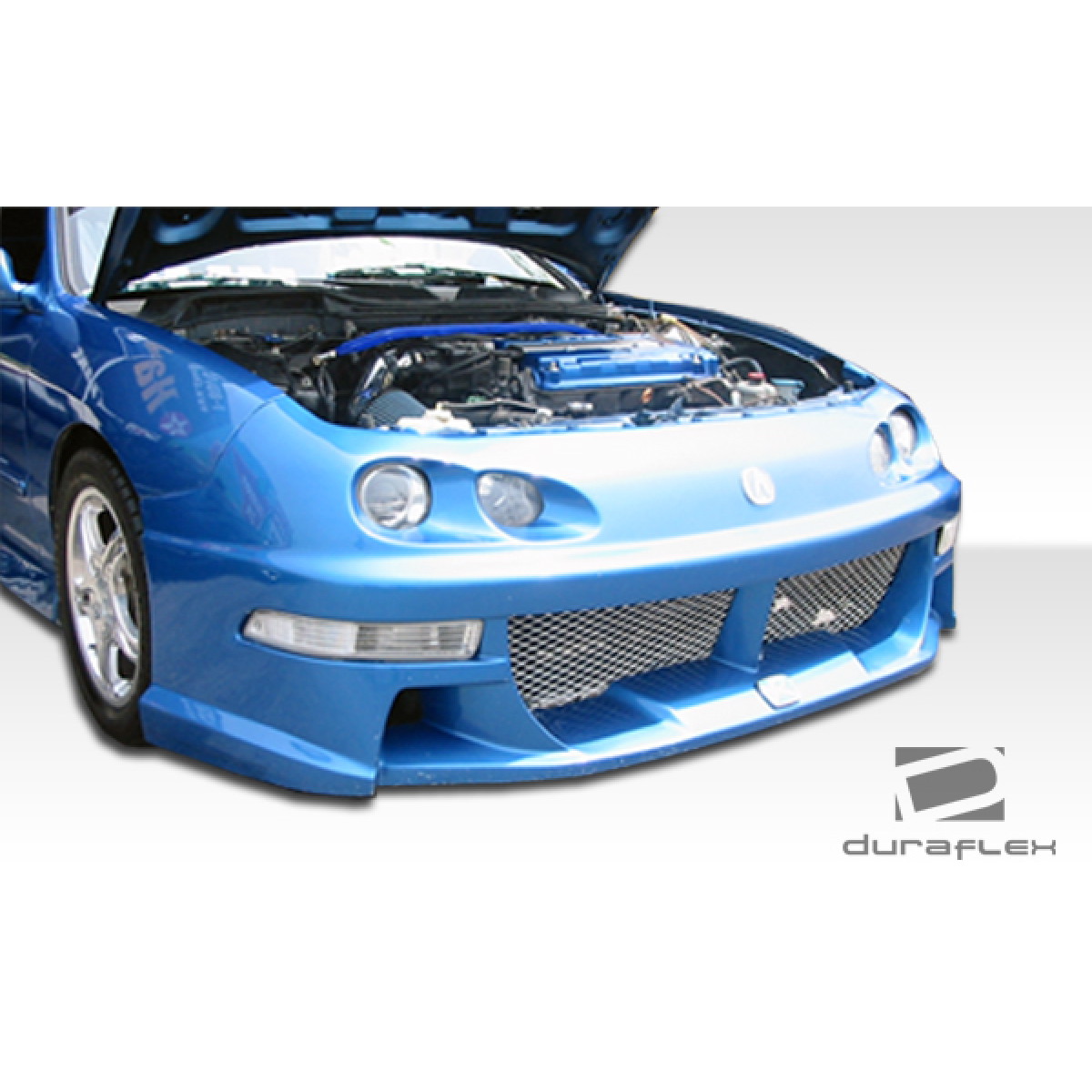 Modify your Acura Integra 1994 with our Exterior/Complete Body Kits - Front angle showing body kit of a blue Acura Integra