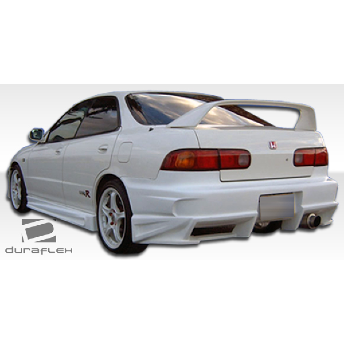 Modify your Acura Integra 1994 with our Exterior/Complete Body Kits - Rear angle of a modified white Acura Integra