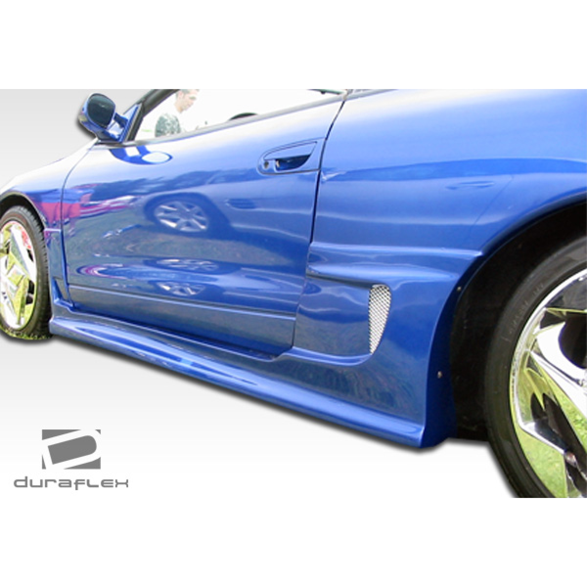 Modify your Eagle Talon 1995 with our Exterior/Complete Body Kits - Side view of a blue vehicle part angle