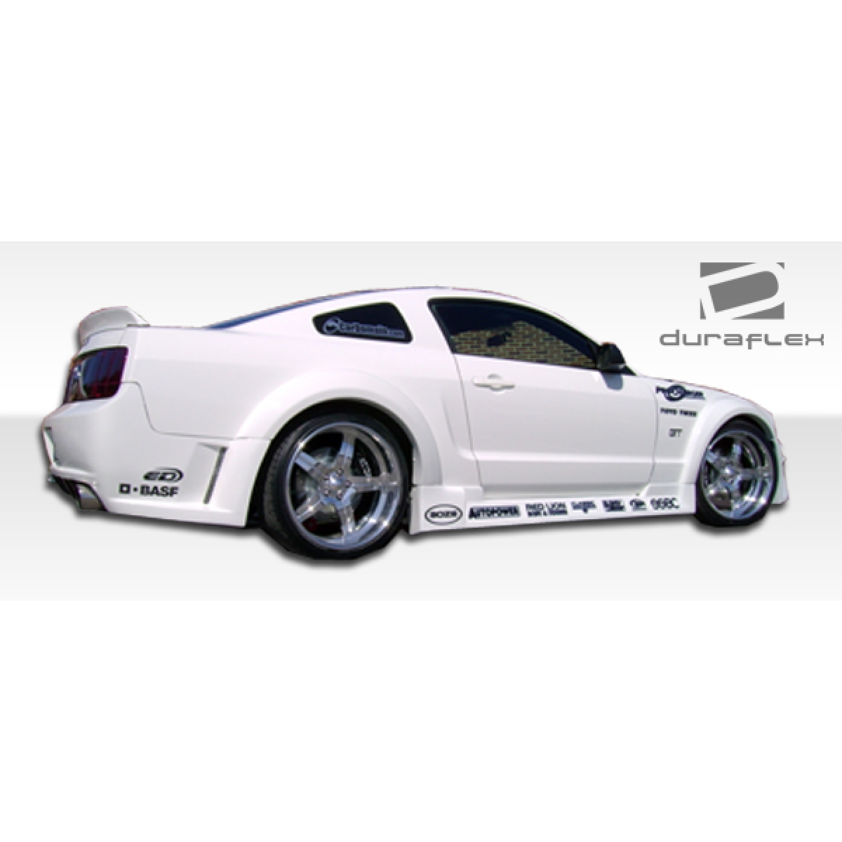 Modify your Ford Mustang 2005 with our Exterior/Complete Body Kits - Side angle view of vehicle showcasing body kit