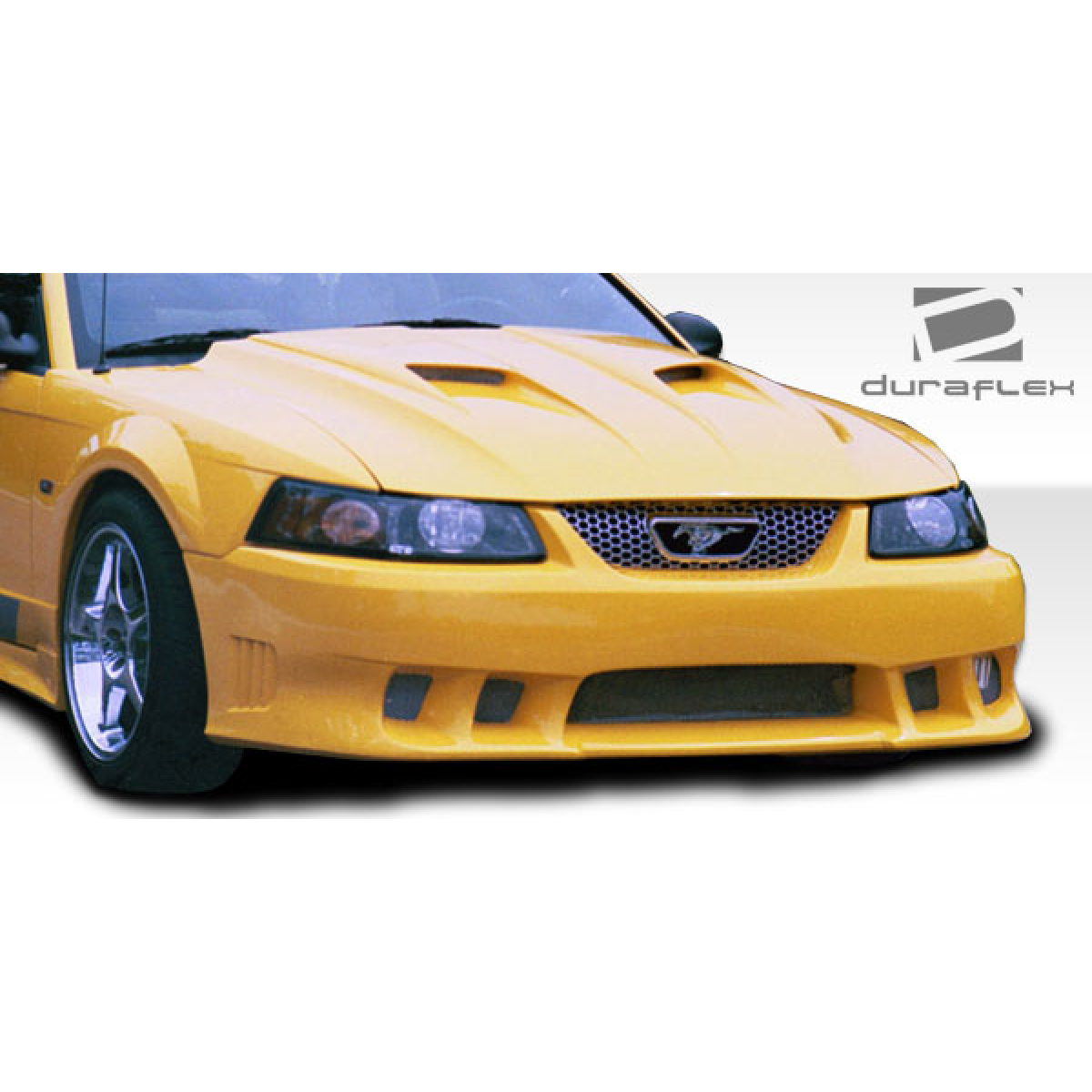 Modify your Ford Mustang 1999 with our Exterior/Complete Body Kits - Front angle view of a modified yellow Mustang