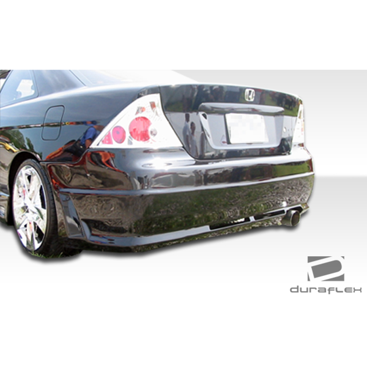 Modify your Honda Civic 2004 with our Exterior/Complete Body Kits - Rear angle showing the body kit on the Honda Civic