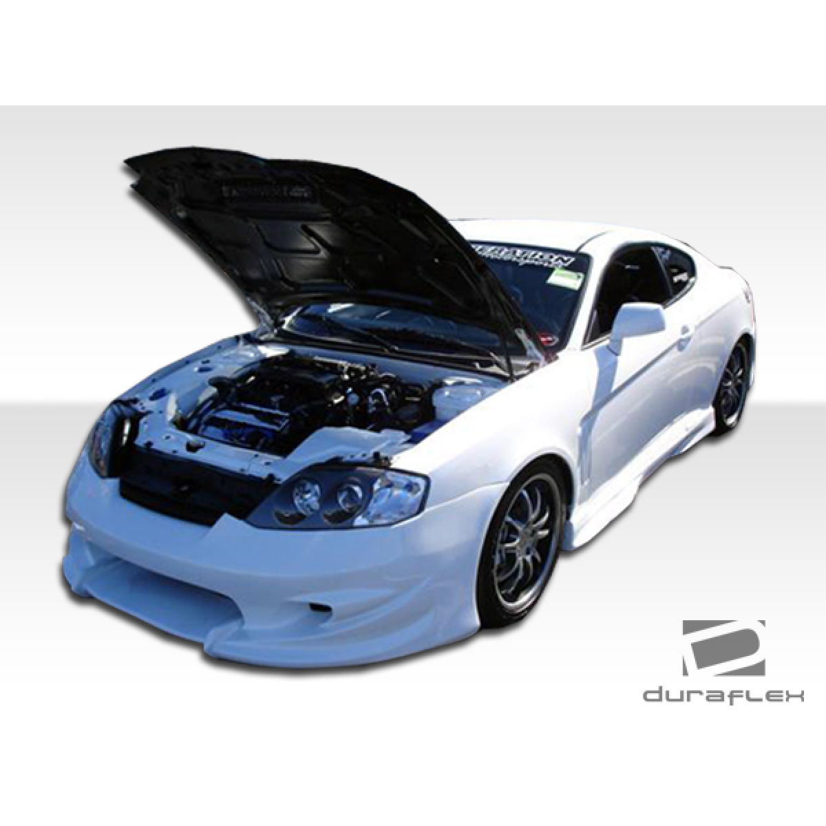Modify your Hyundai Tiburon 2003 with our Exterior/Complete Body Kits - Front angle of vehicle with open hood