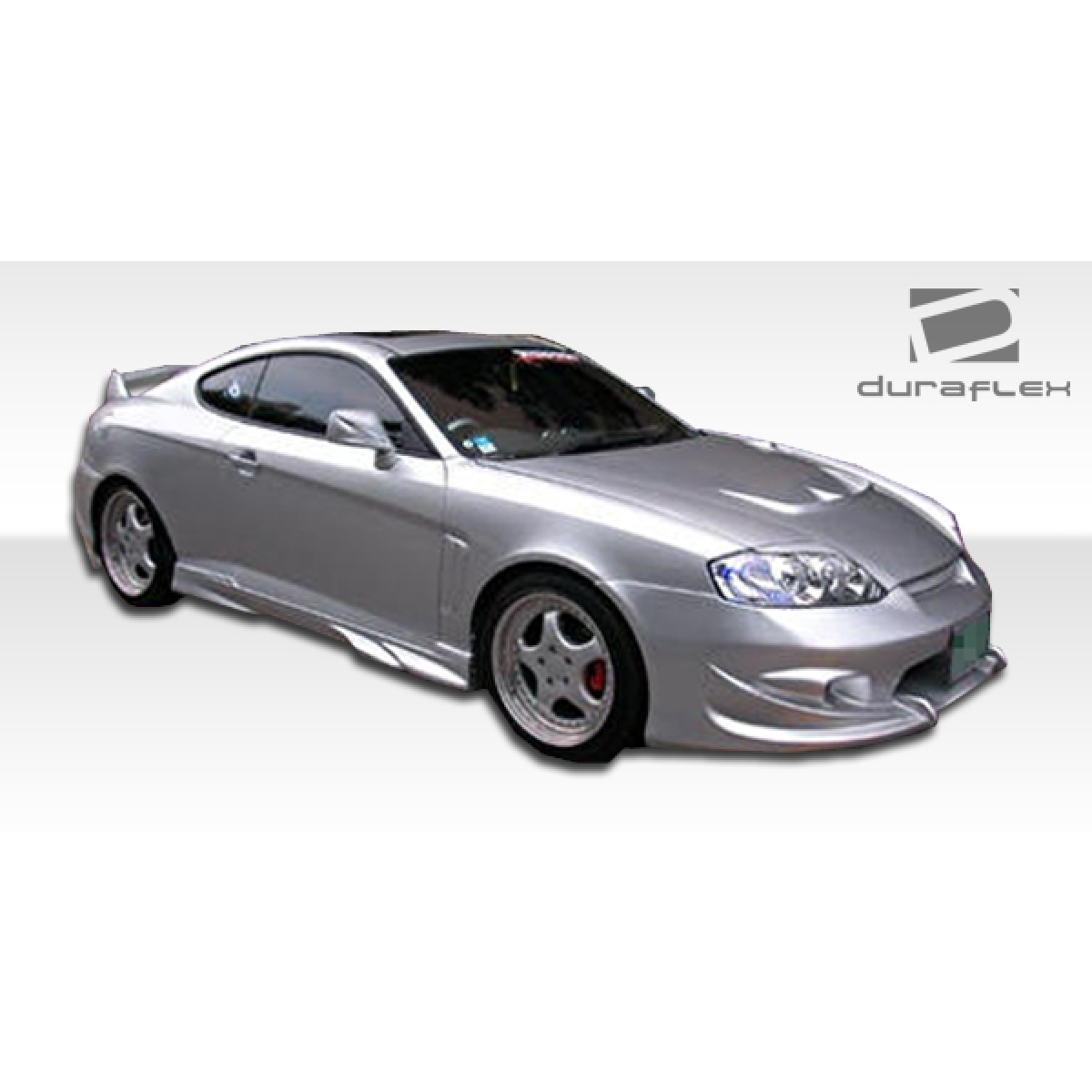 Modify your Hyundai Tiburon 2003 with our Exterior/Complete Body Kits - Image shows vehicle from a front side angle