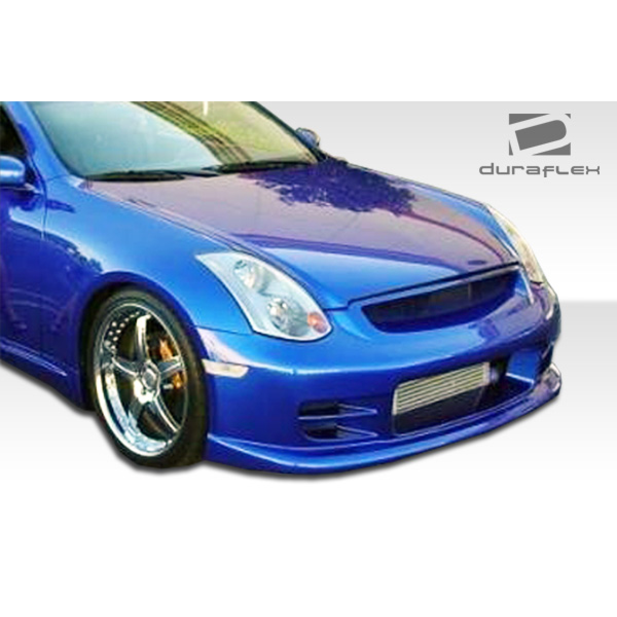Modify your Infiniti G35 2003 with our Exterior/Complete Body Kits - Image shows low angle view of front body kit