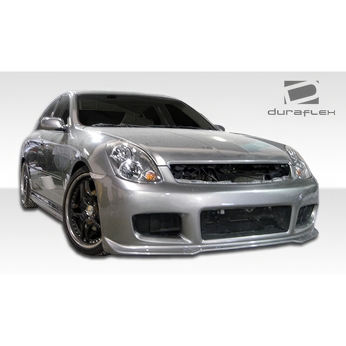 Modify your Infiniti G35 2003 with our Exterior/Complete Body Kits - Front angle view of a silver Infiniti G35