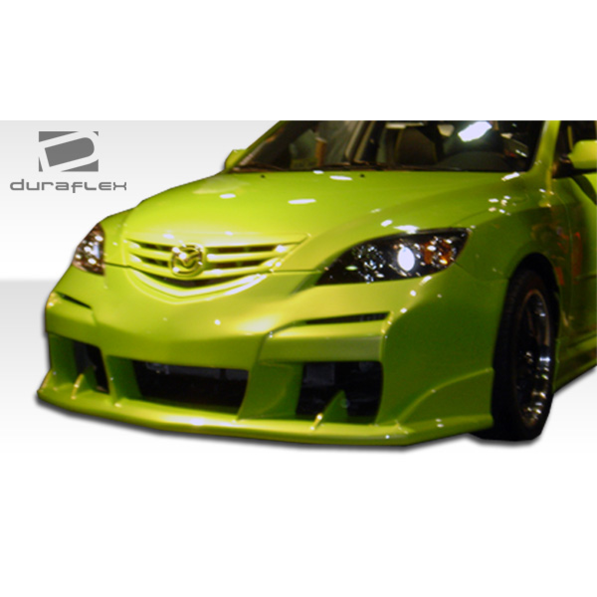 Modify your Mazda 3 2004 with our Exterior/Complete Body Kits - Front angle view of a modified Mazda 3