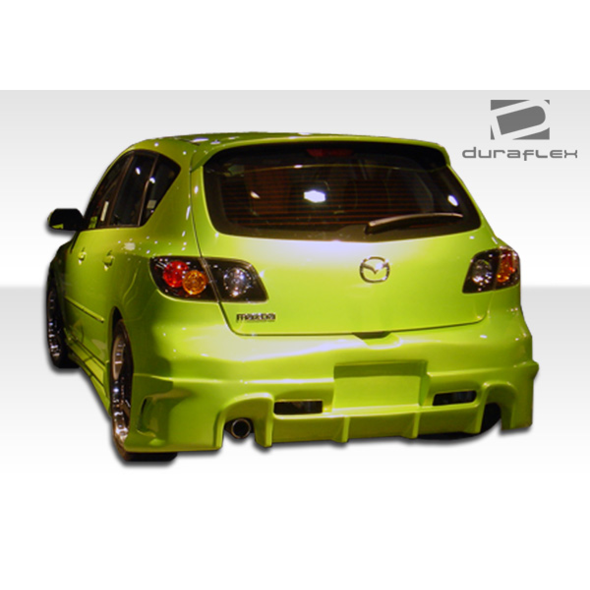 Modify your Mazda 3 2004 with our Exterior/Complete Body Kits - View from the rear and slight side angle