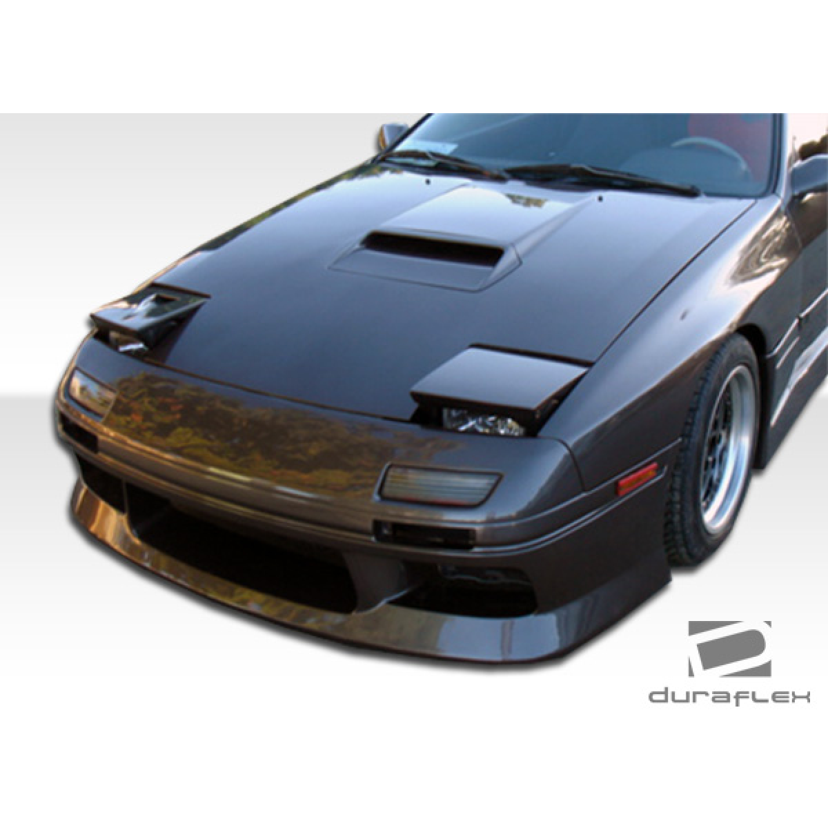 Modify your Mazda RX-7 1986 with our Exterior/Complete Body Kits - The part is viewed at a frontal angle